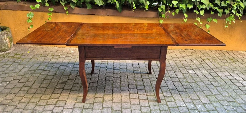 Antique extendable pull-out table moved legs