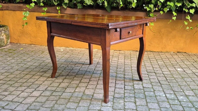 Antique extendable pull-out table moved legs