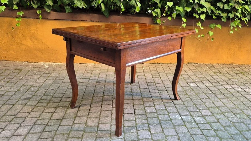 Antique extendable pull-out table moved legs