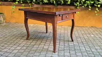Antique extendable pull-out table moved legs