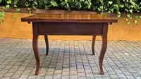 Antique extendable pull-out table moved legs